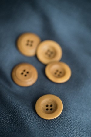 22 mm Corozo knapp gyllen